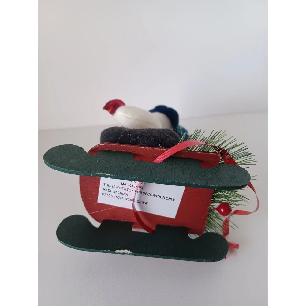 Vintage Snowman Holiday Seasonal Christmas On Sled Ornament Collectible